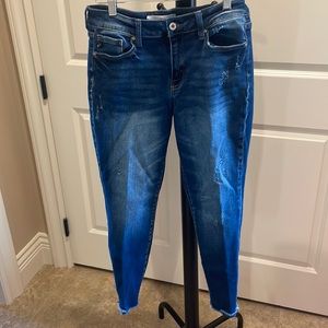 Kancan jeans with raw edge hem. Like new, stretch with slight distressing.